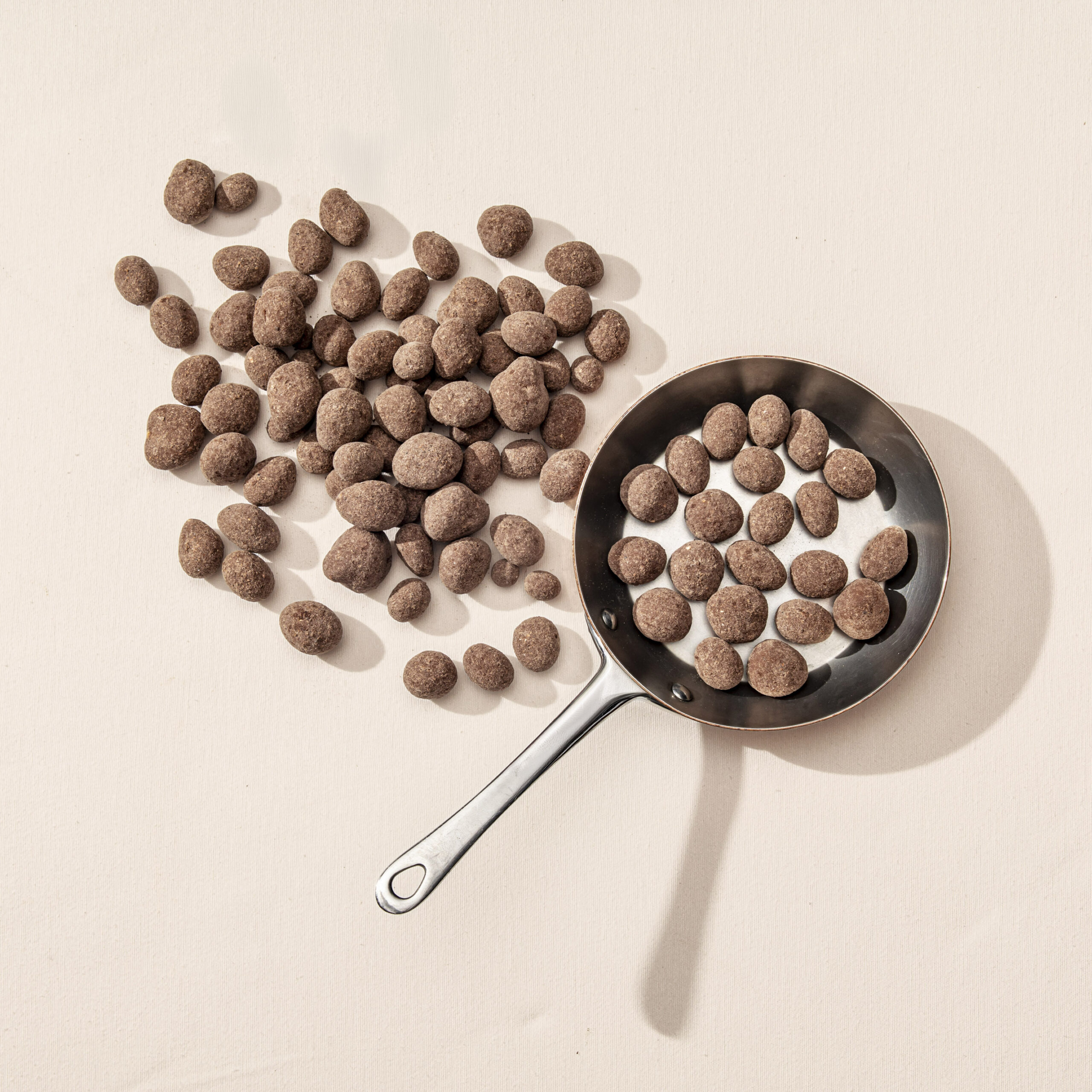 Cacahuètes enrobées de chocolat au lait